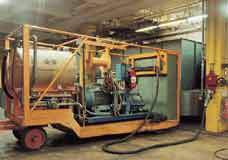 DS 200 amp connects a mobile cleaning equipment in a paint shop.